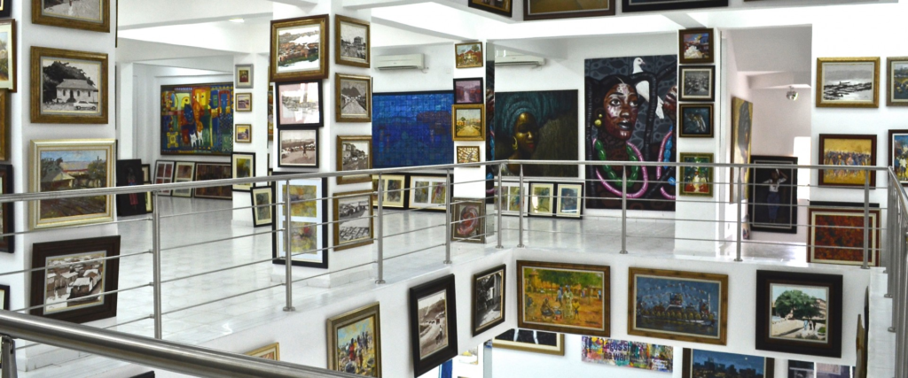 Interior of Nike Art Gallery showcasing vibrant Nigerian artwork